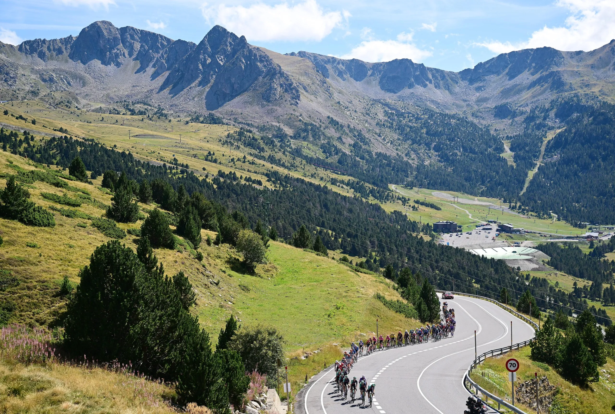 A general view of the peloton compete climbing to the Port d’Envalira