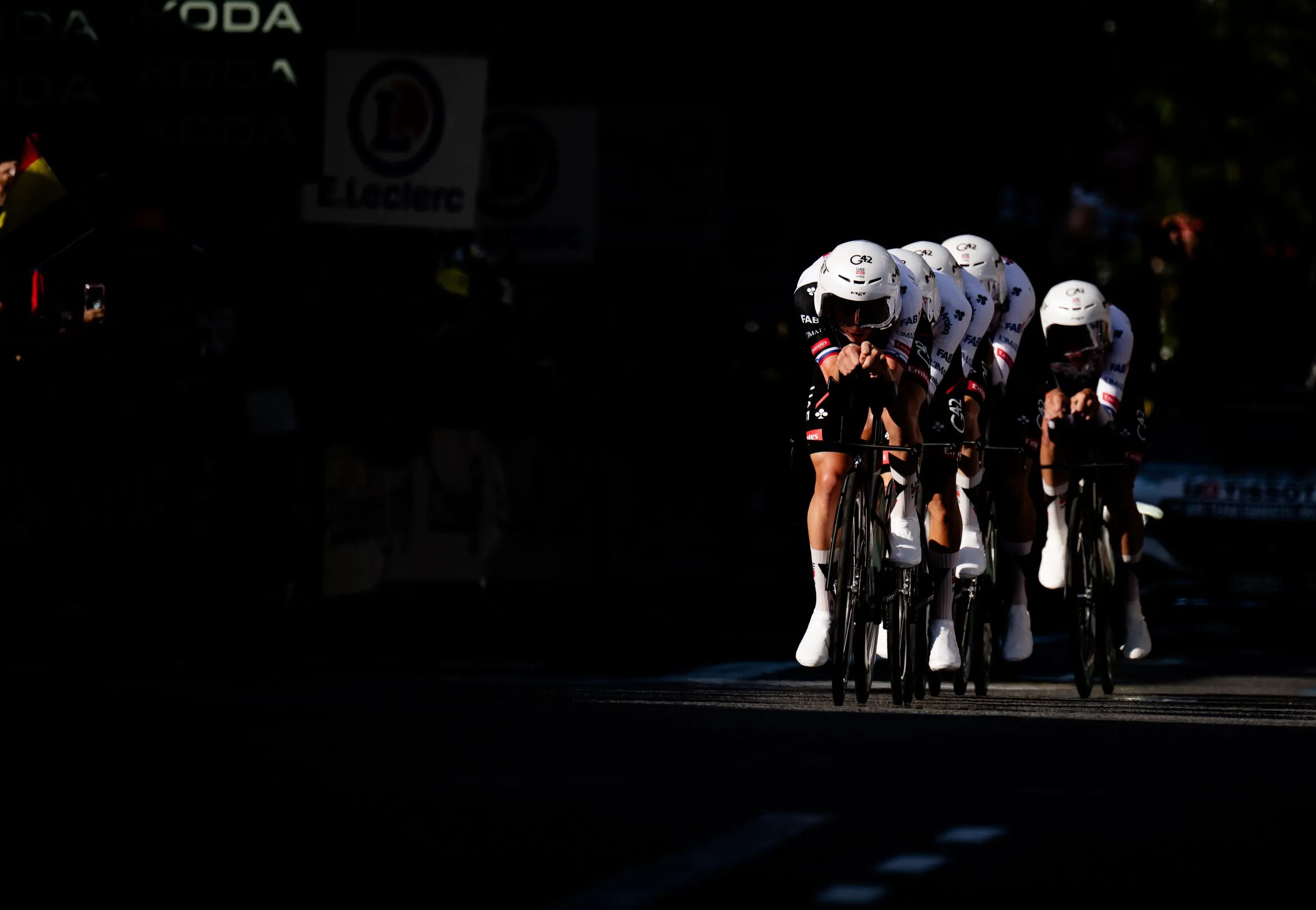The UAE Emirates XRG team, lead by Tadej Pogacar, power around the streets of Barcelona.