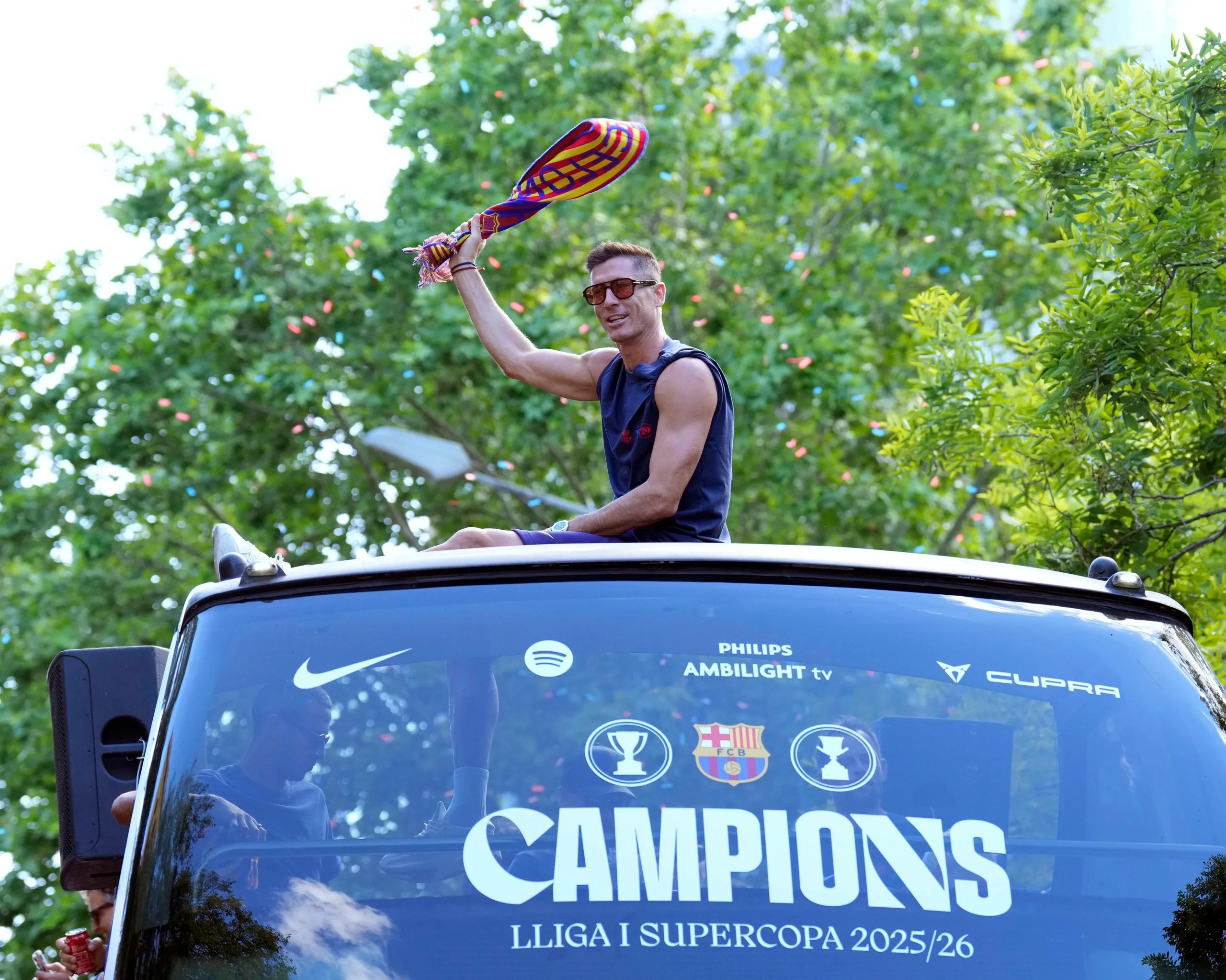 Robert Lewandowski celebrates winning the league title during a parade through the streets of Barcelona earlier this week