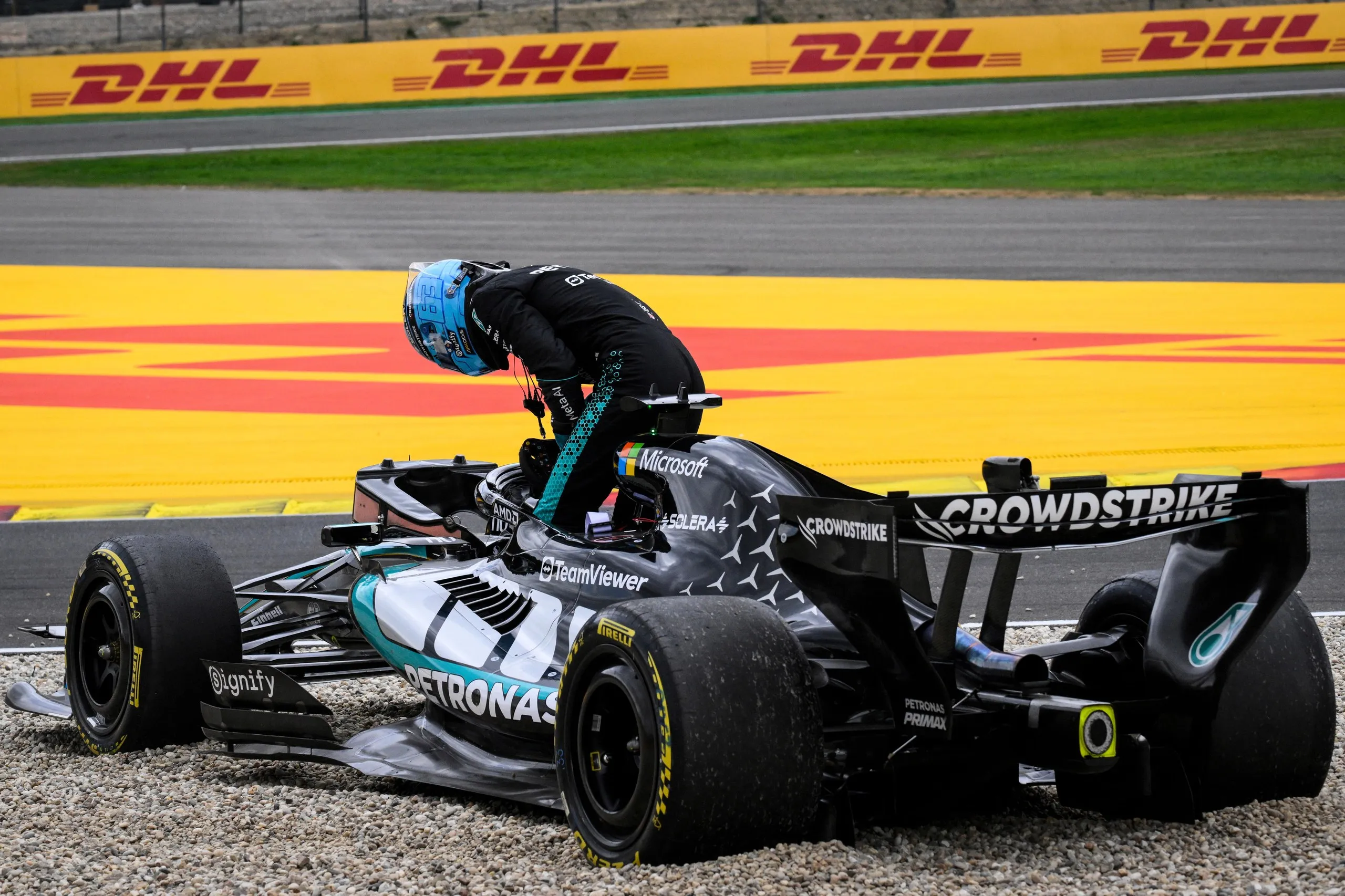 George Russell leaves the cockpit of his car