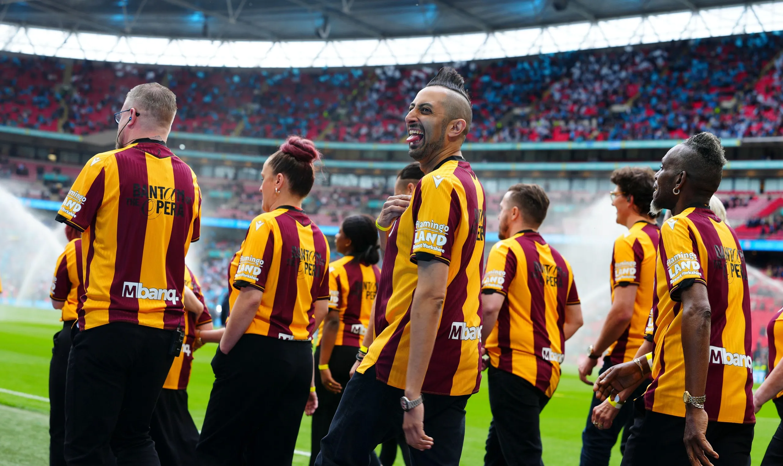 Bradford City choir walk along the touchline at Wembley.