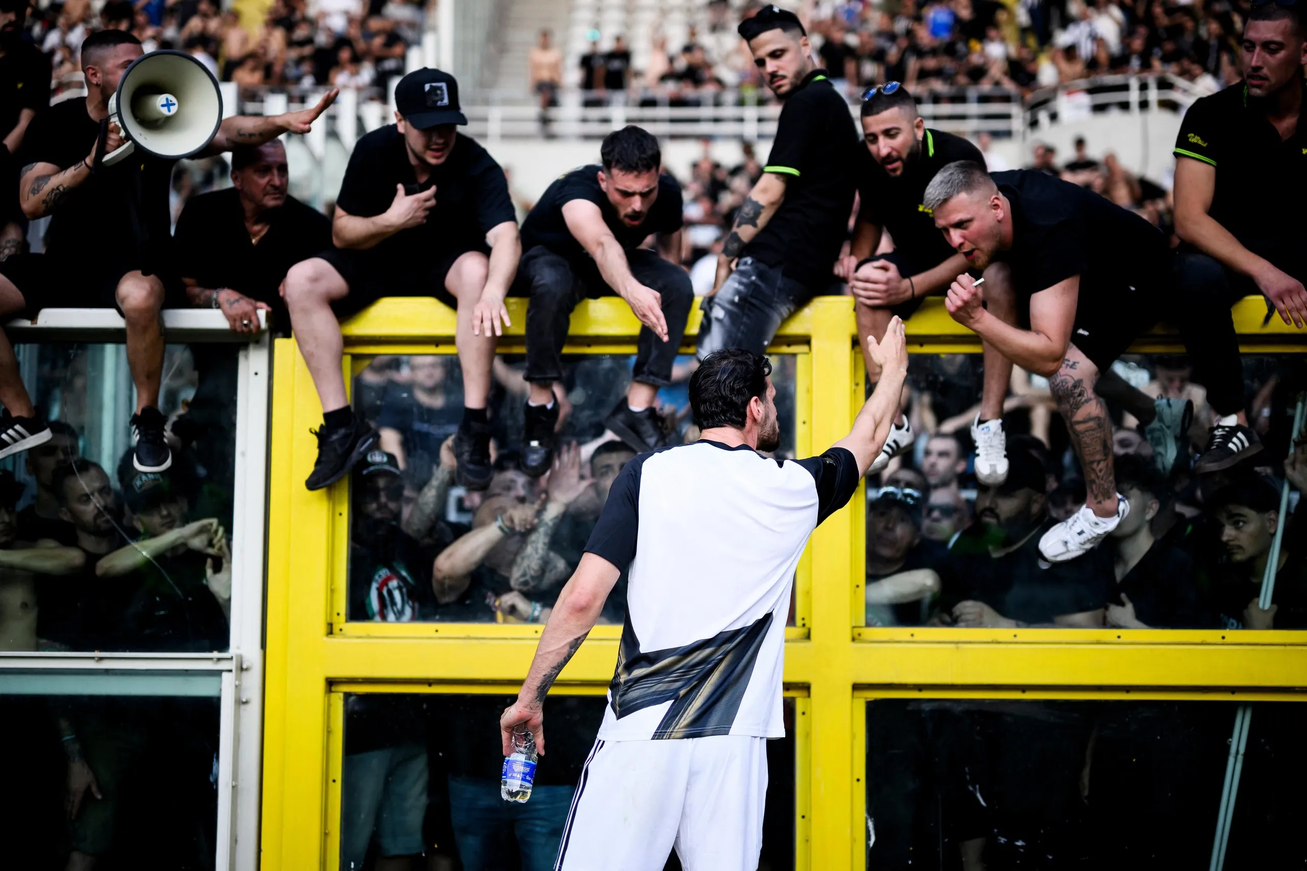 Manuel Locatelli speaks to fans after trouble in Turin