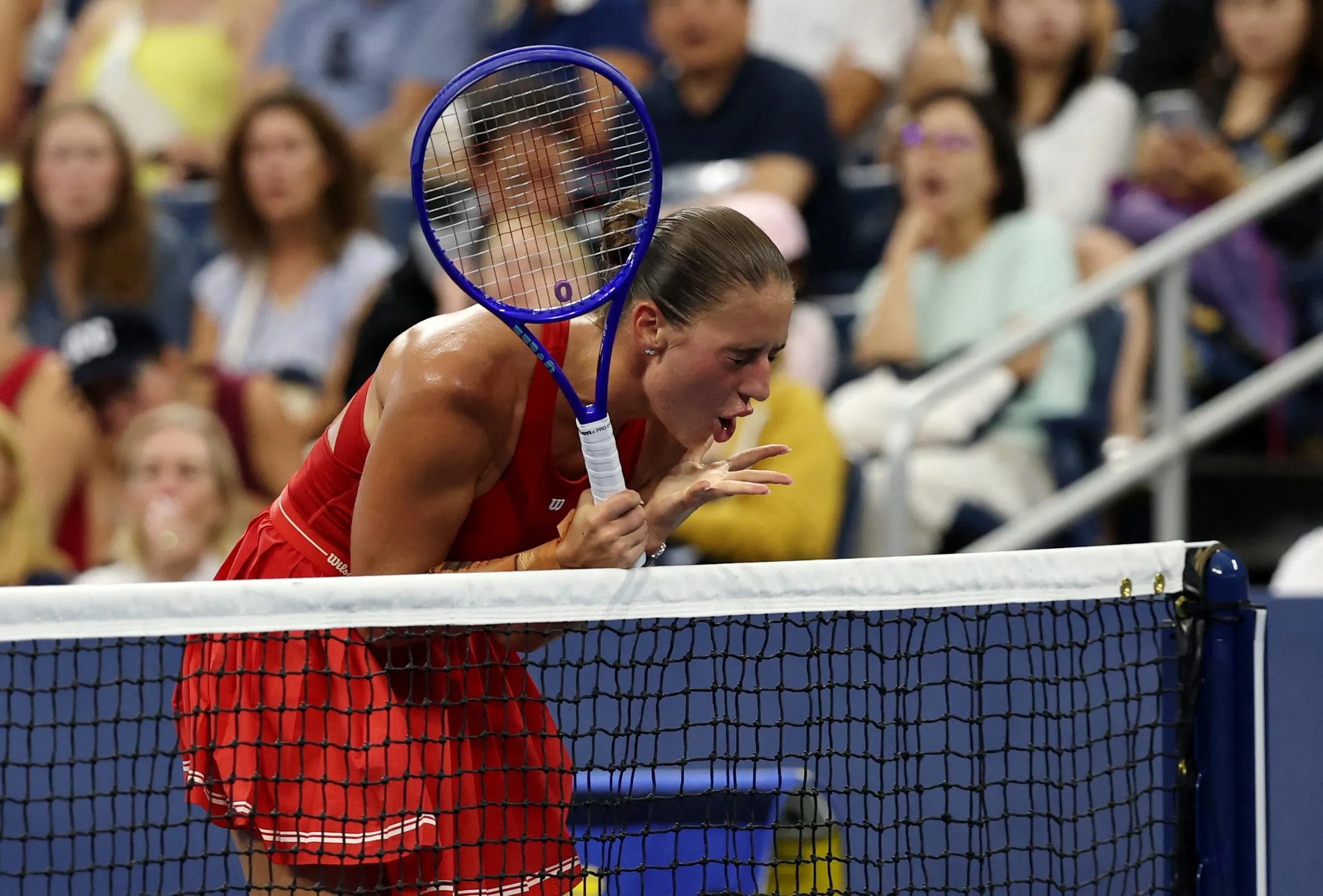 Marta Kostyuk reacts during her second round match against Sloane Stephens.
