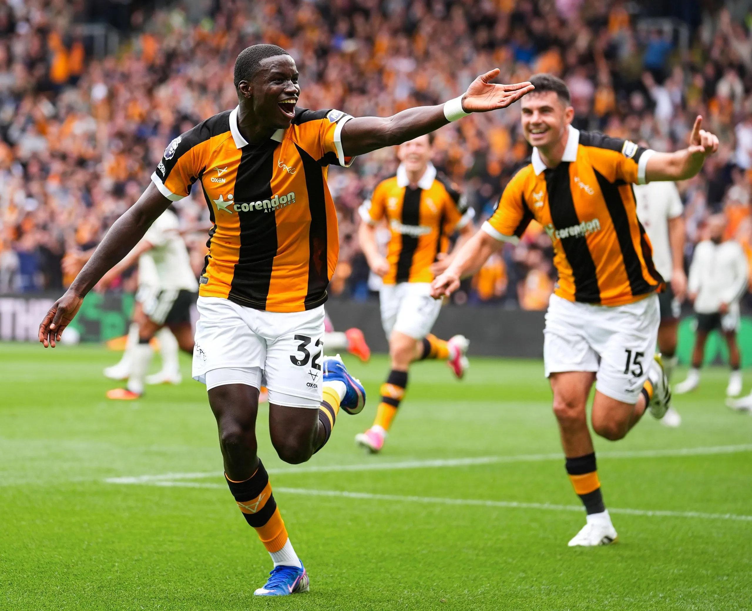 Nobel Mendy celebrates after scoring for Hull against Manchester United.