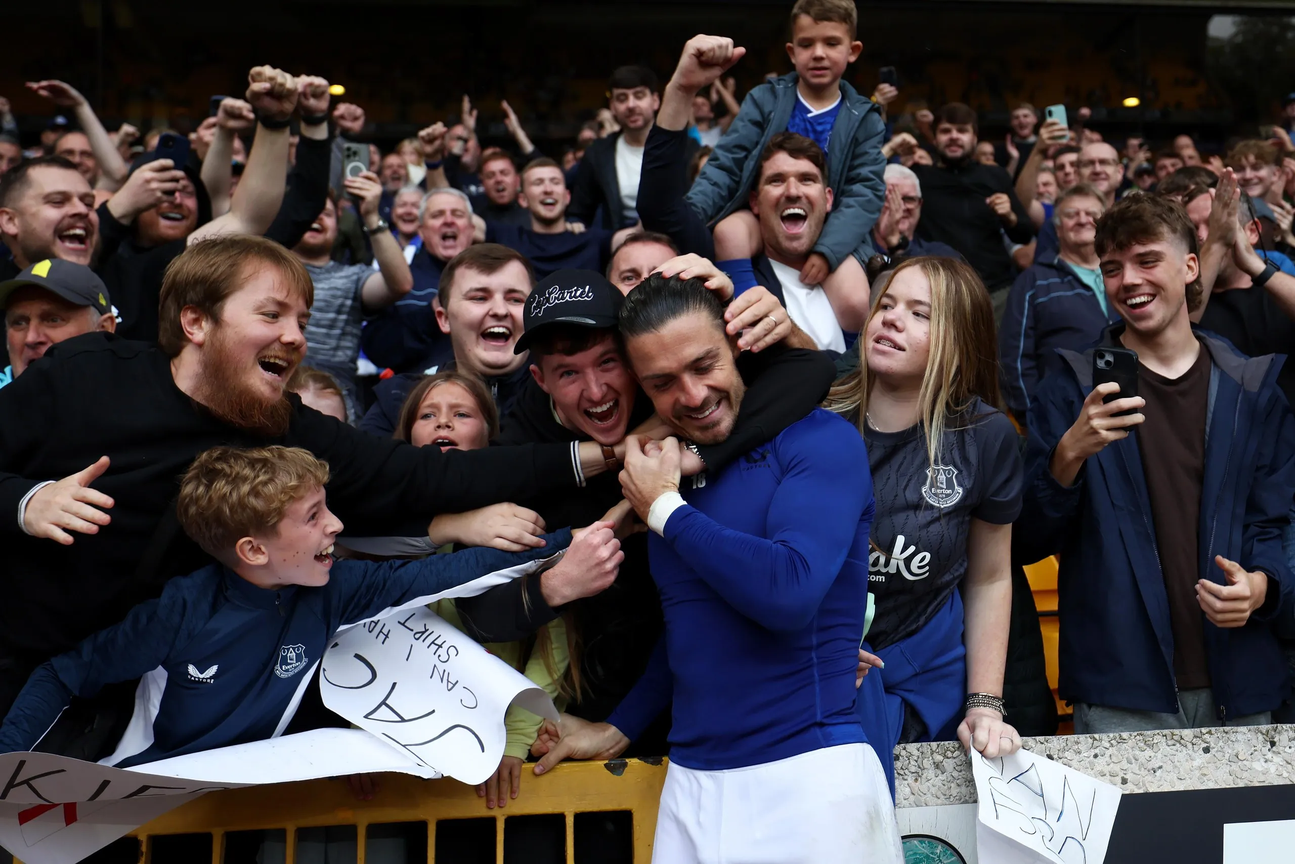 Jack Grealish celebrates with Everton fans