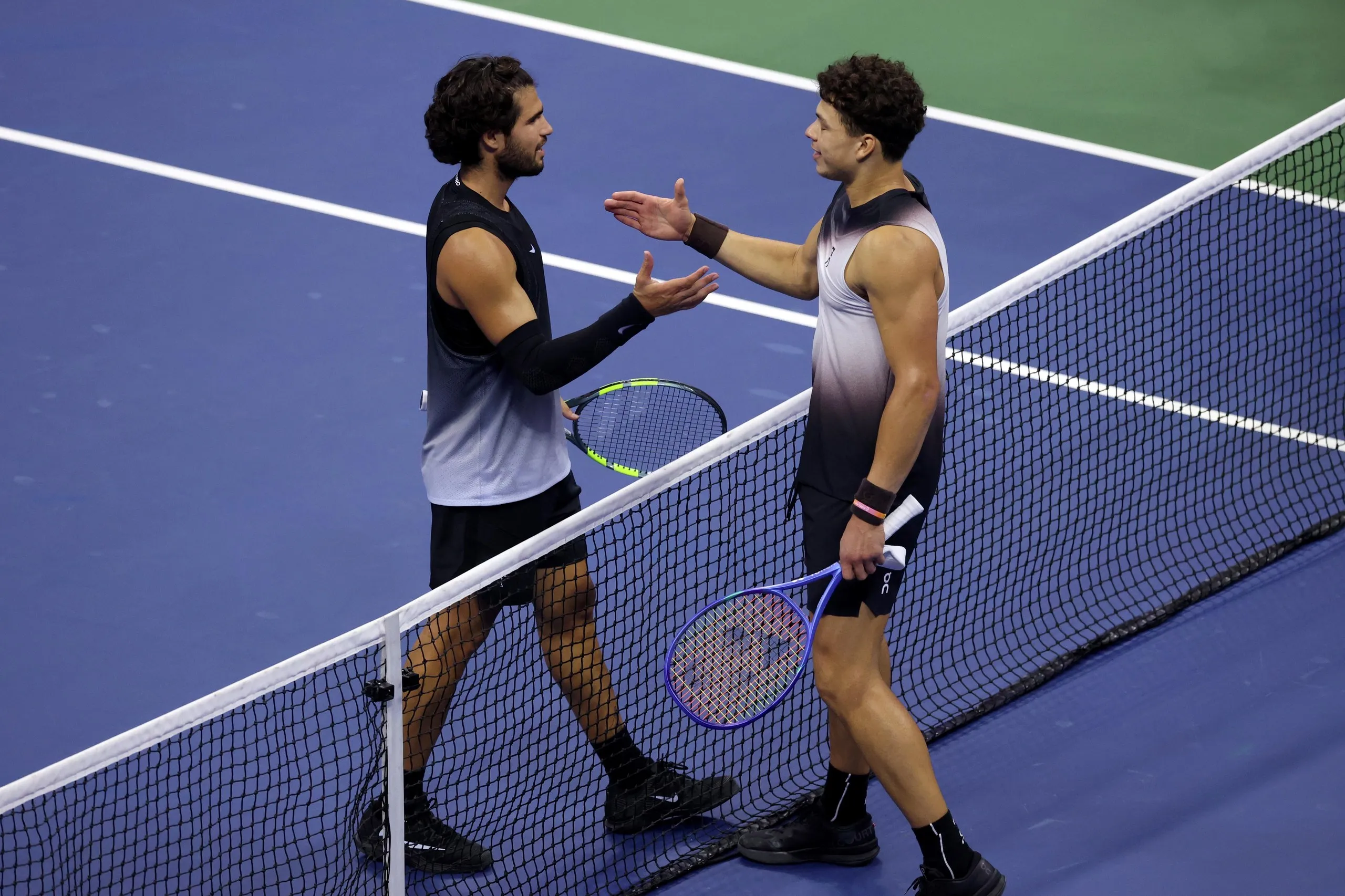Carlos Alcaraz and Ben Shelton greet each other after their quarter-final