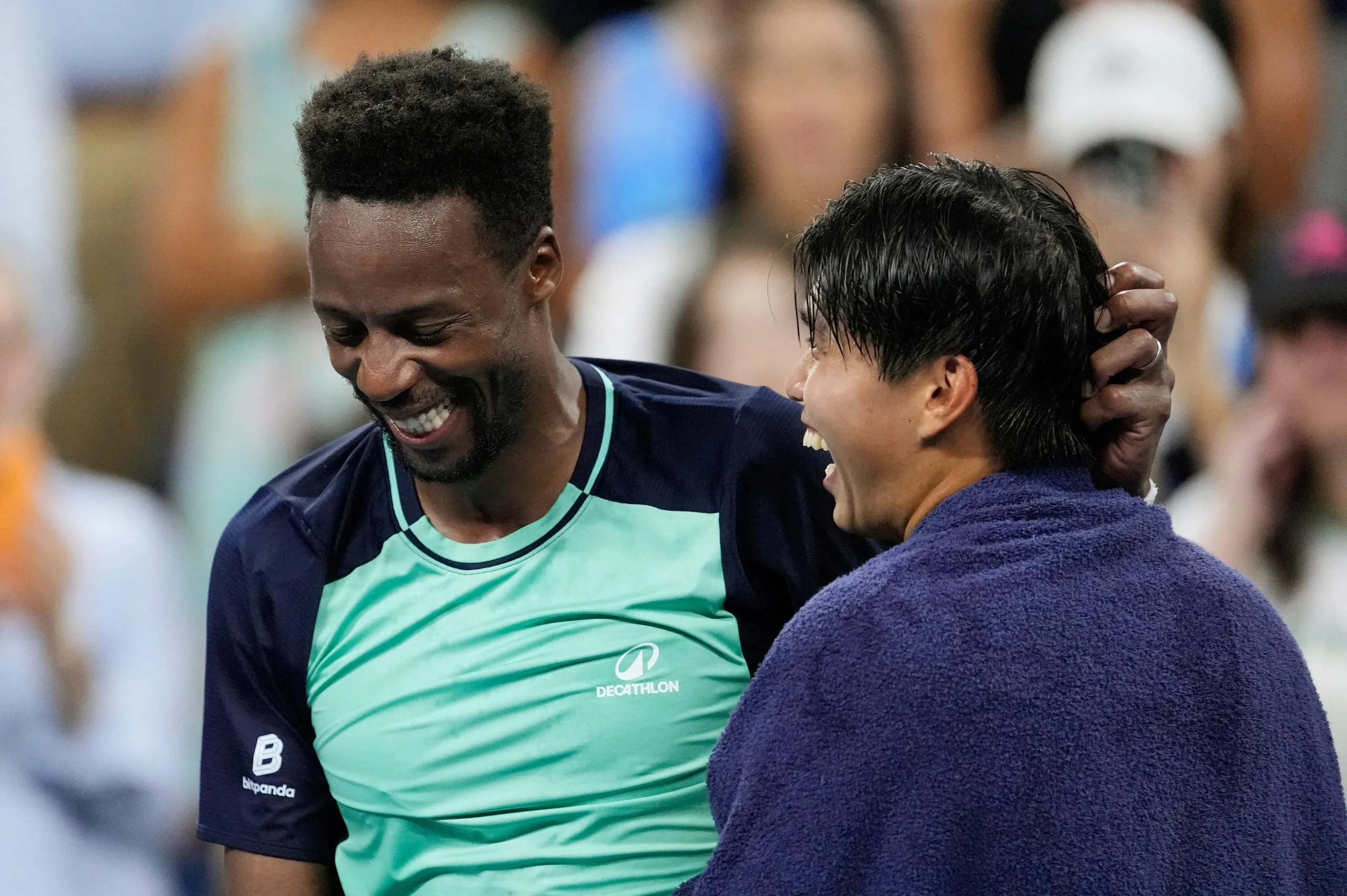Gaël Monfils shares a laugh with Learner Tien after the Frenchman’s second-round defeat at the US Open on Thursday.