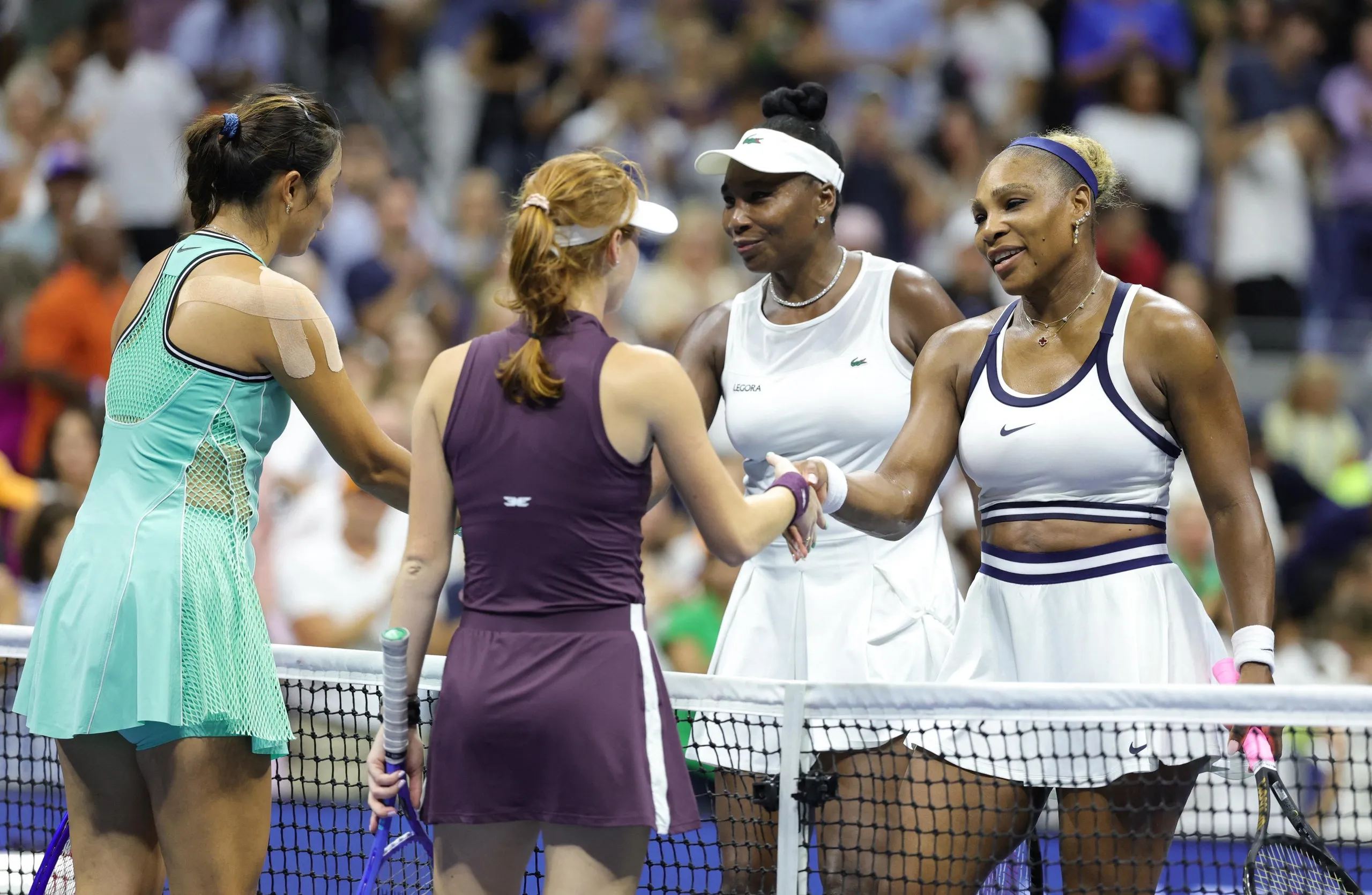 Williams sisters Serena and Venus shake hands with Maya Joint and Hao-Ching Chan after their women’s doubles match at the 2026 US Open