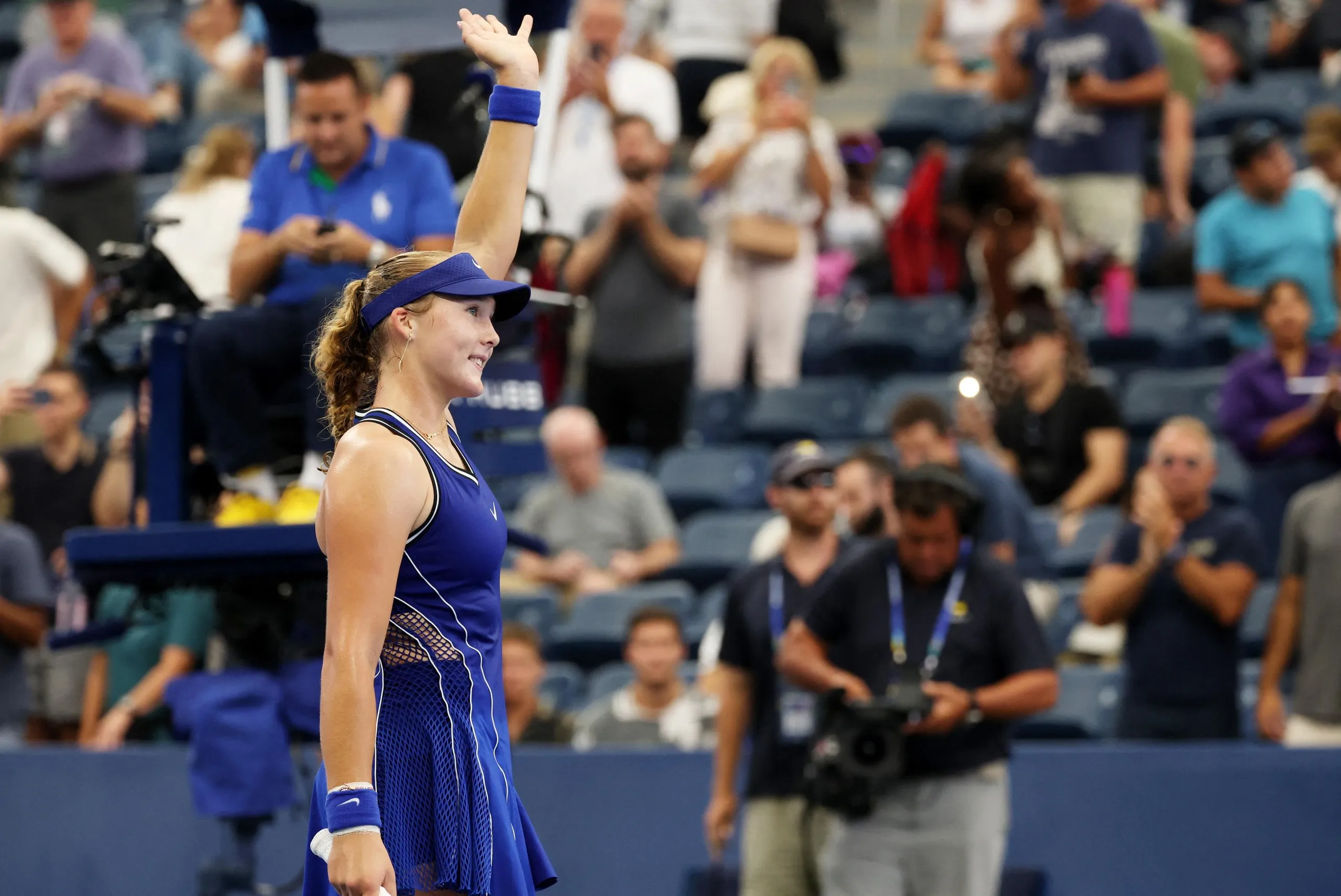 Mirra Andreeva celebrates after winning her first round match against Indonesia's Janice Tjen.