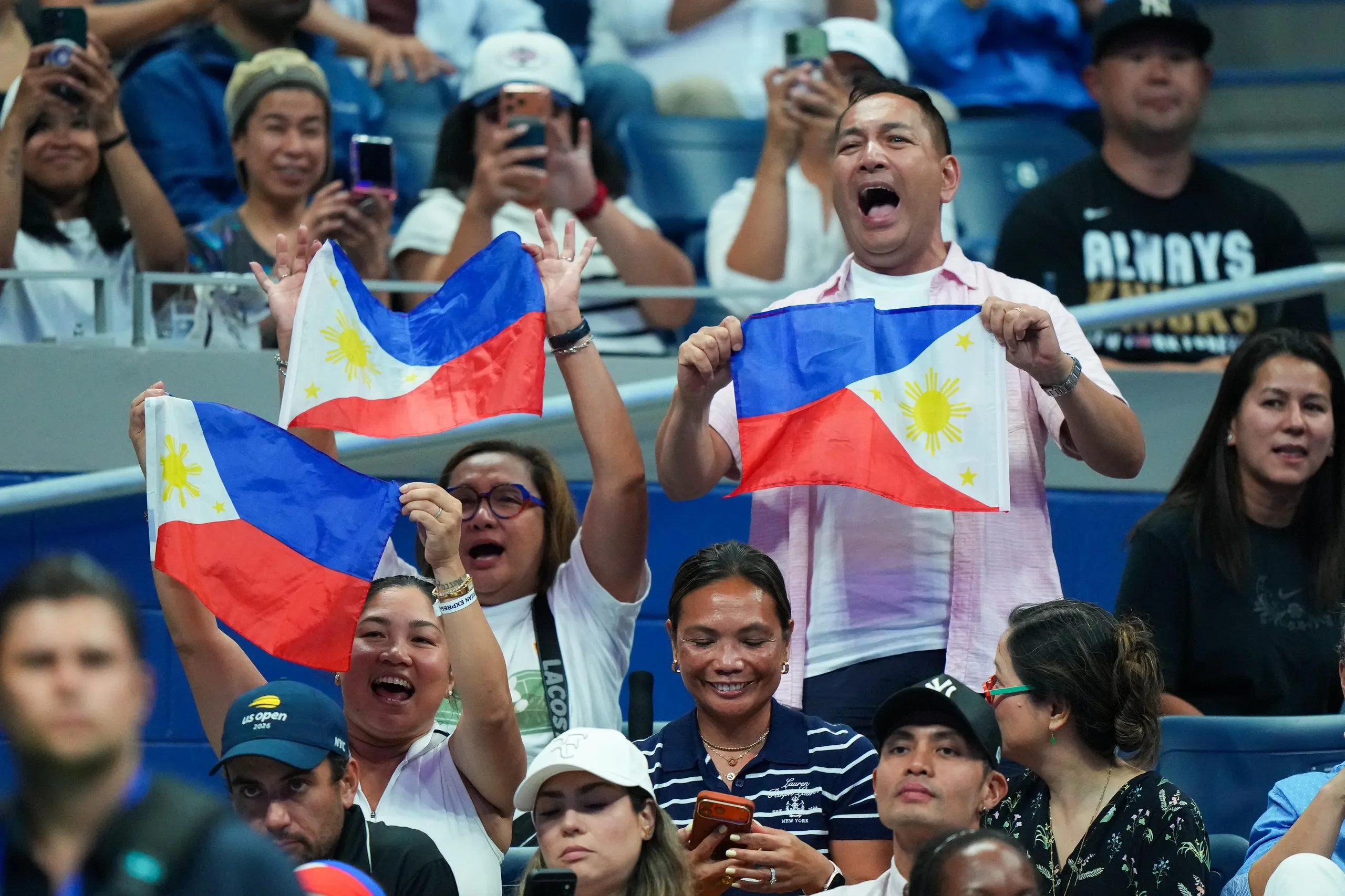 Fans cheer Alex Eala during a Stars of the Open exhibition session